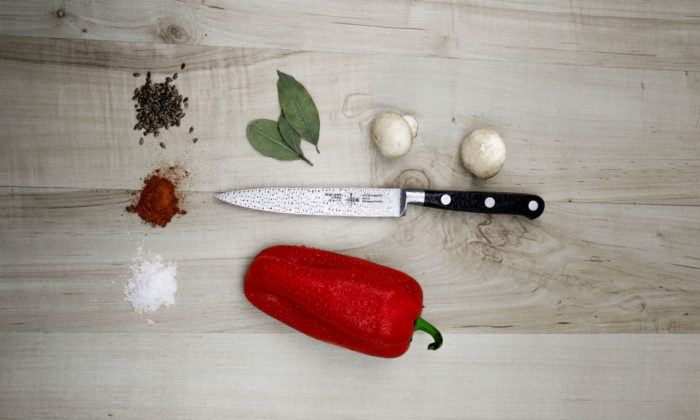 3 types of spices on the left, one red pepper, one knife, 3 basil leaves and two mushrooms