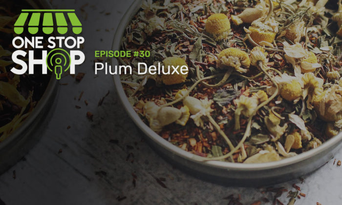 Episode #30 with Plum Deluxe. A bowl of herbs and flowers on a white wooden table